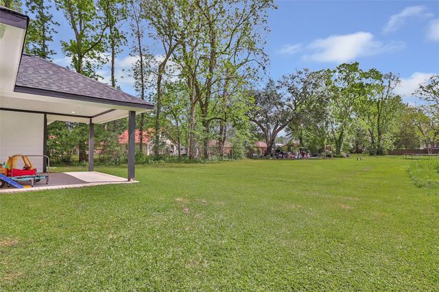 451 County Road 2358, Hardin, TX 77575