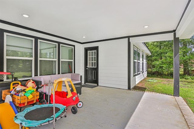 451 County Road 2358, Hardin, TX 77575