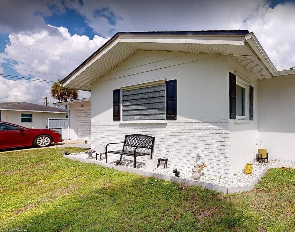 129 E Lake DR, LEHIGH ACRES, FL 33936 — photo 4