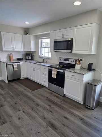 112 ROWLAND RD, Lehigh Acres, FL 33936