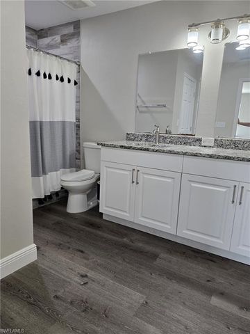 112 ROWLAND RD, Lehigh Acres, FL 33936