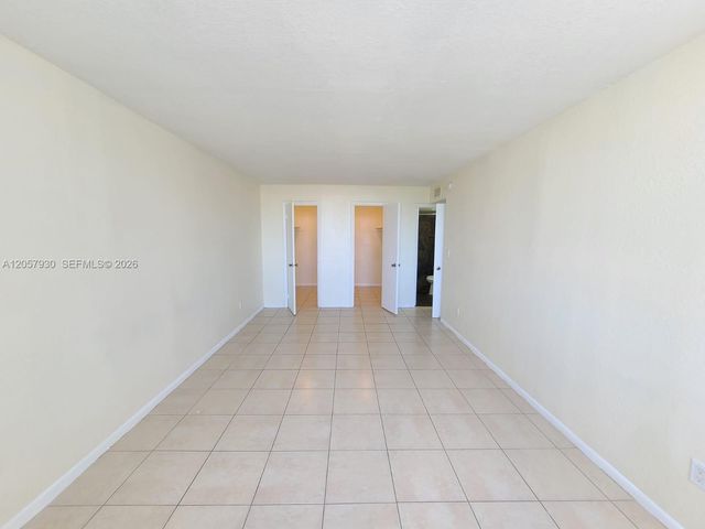496 NW 165th St Rd D-409, Miami, FL 33169