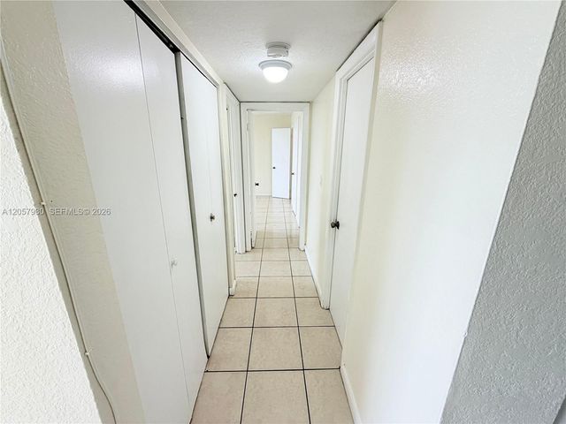 496 NW 165th St Rd D-409, Miami, FL 33169