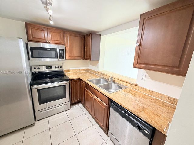 496 NW 165th St Rd D-409, Miami, FL 33169
