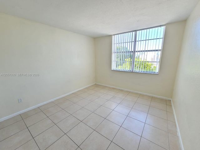 496 NW 165th St Rd D-409, Miami, FL 33169