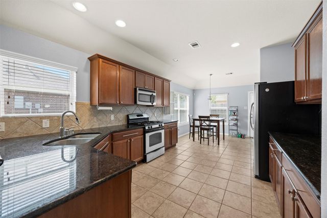 1707 Hickory Burl Lane, Conroe, TX 77301