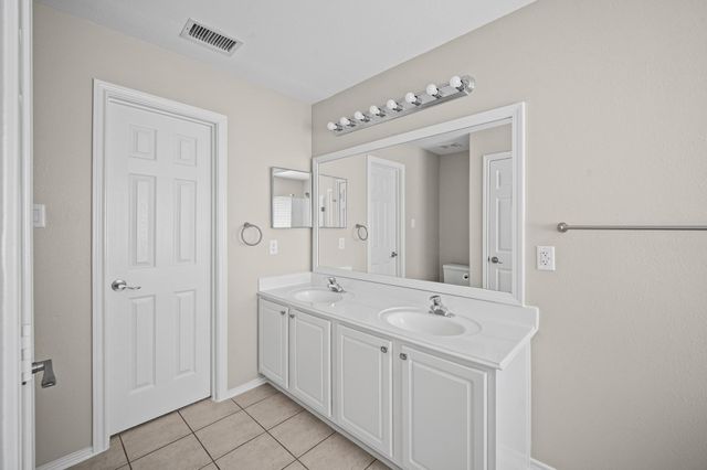 11 Scenic Brook Court, The Woodlands, TX 77382