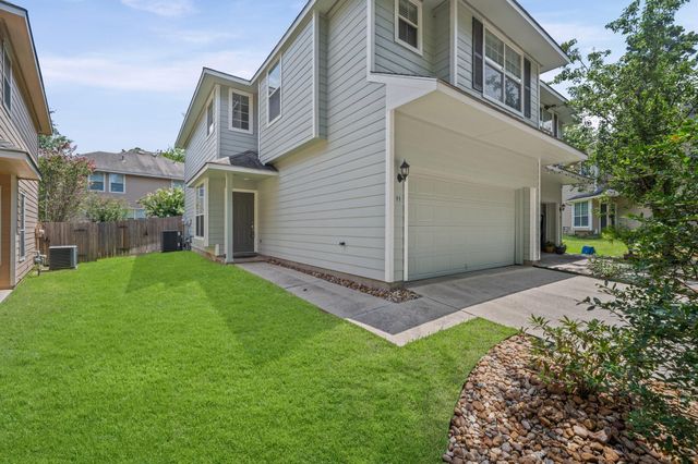 11 Scenic Brook Court, The Woodlands, TX 77382