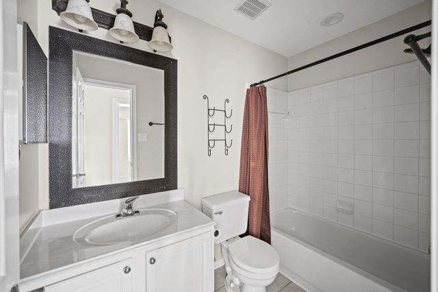 11 Scenic Brook Court, The Woodlands, TX 77382