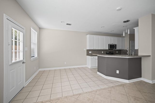 11 Scenic Brook Court, The Woodlands, TX 77382