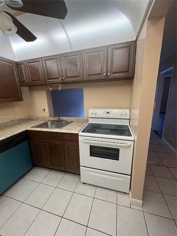 2800 NW 56th Ave E104, Lauderhill, FL 33313