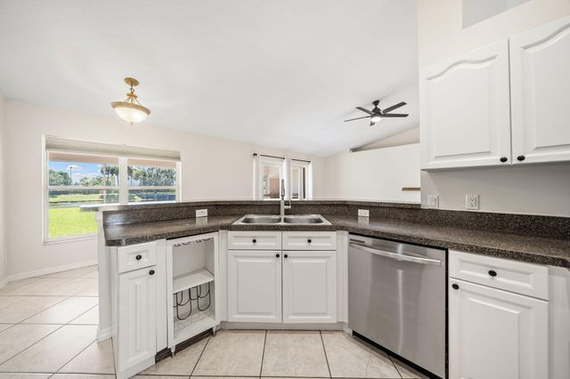 111 Meadow Woode Drive, Royal Palm Beach, FL 33411