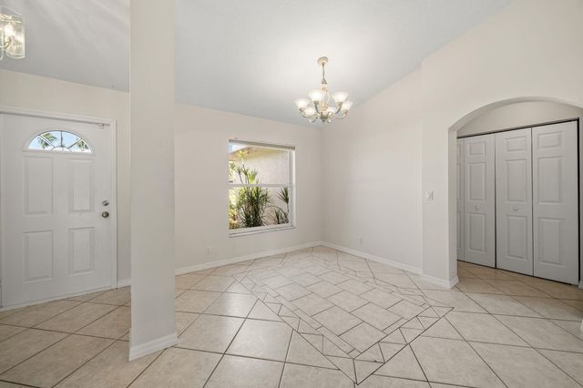 111 Meadow Woode Drive, Royal Palm Beach, FL 33411