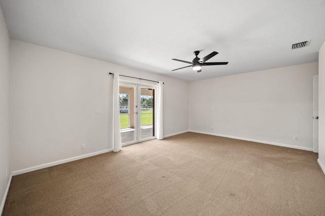 111 Meadow Woode Drive, Royal Palm Beach, FL 33411