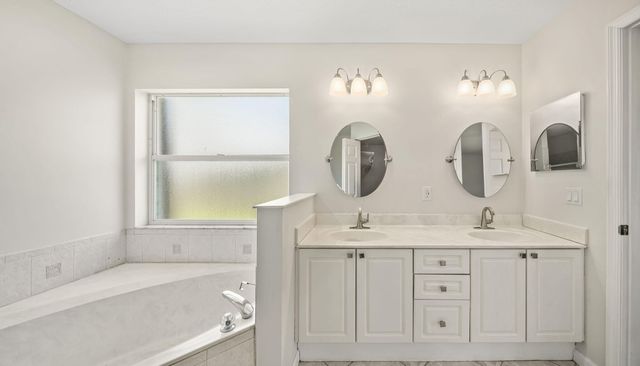 111 Meadow Woode Drive, Royal Palm Beach, FL 33411