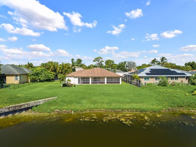 111 Meadow Woode Drive, Royal Palm Beach, FL 33411