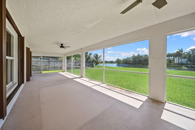 111 Meadow Woode Drive, Royal Palm Beach, FL 33411