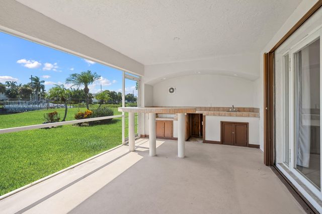 111 Meadow Woode Drive, Royal Palm Beach, FL 33411