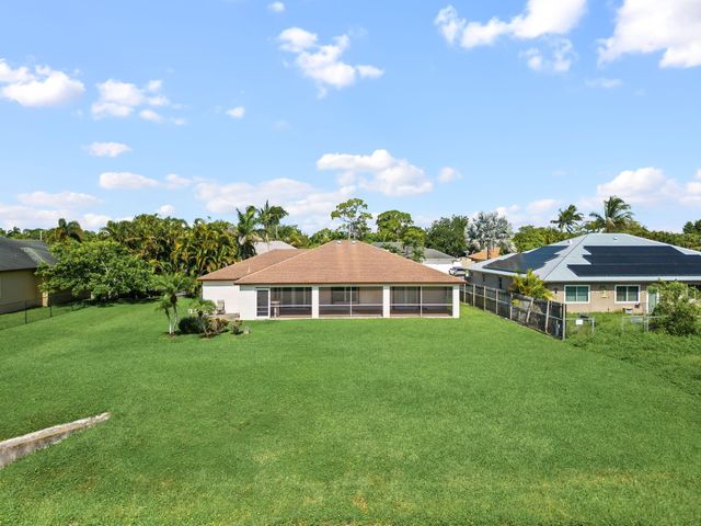 111 Meadow Woode Drive, Royal Palm Beach, FL 33411