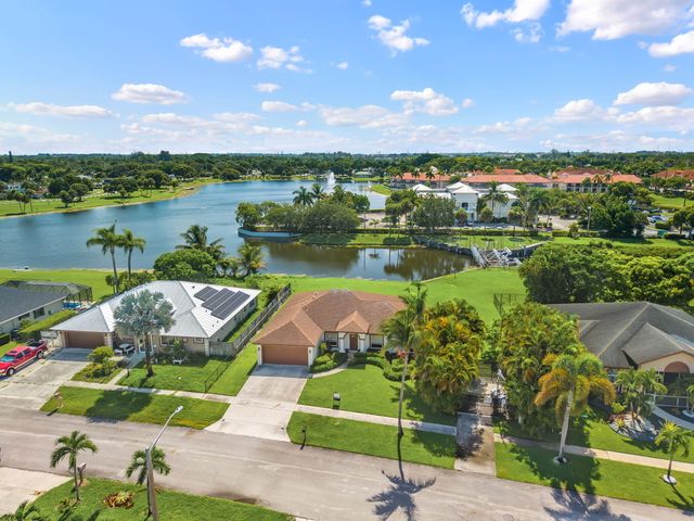 111 Meadow Woode Drive, Royal Palm Beach, FL 33411