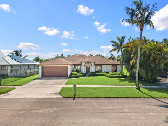 111 Meadow Woode Drive, Royal Palm Beach, FL 33411