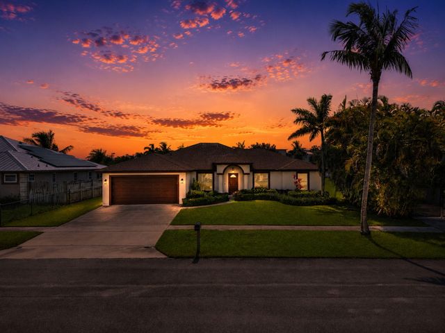 111 Meadow Woode Drive, Royal Palm Beach, FL 33411