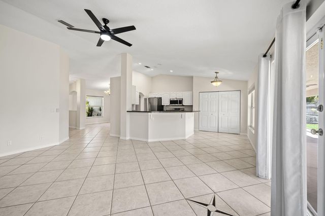 111 Meadow Woode Drive, Royal Palm Beach, FL 33411
