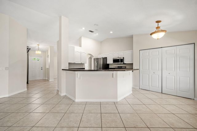 111 Meadow Woode Drive, Royal Palm Beach, FL 33411