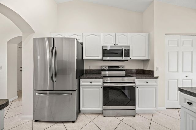 111 Meadow Woode Drive, Royal Palm Beach, FL 33411