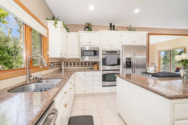 9031 Highview Lane, Woodbury, MN 55125