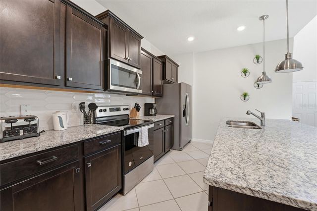 1293 EMERALD ROW STREET, Clermont, FL 34714