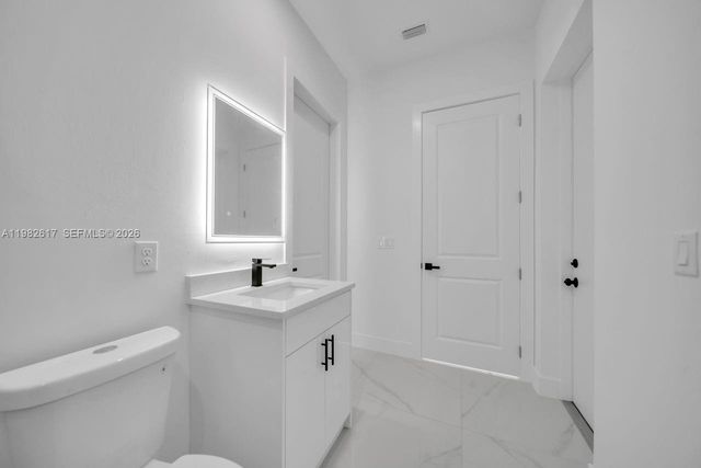 637 Summit Ave S, Lehigh Acres, FL 33974