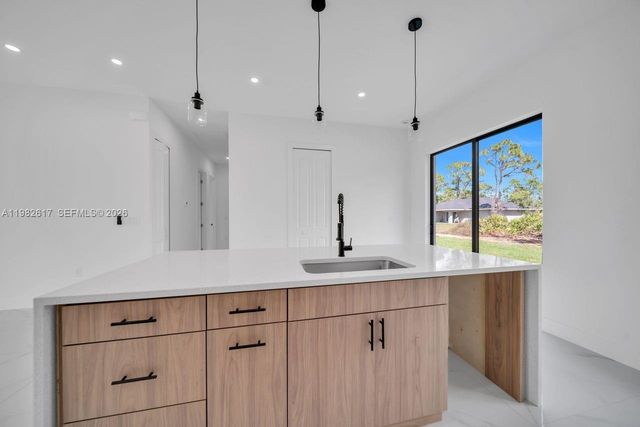 637 Summit Ave S, Lehigh Acres, FL 33974