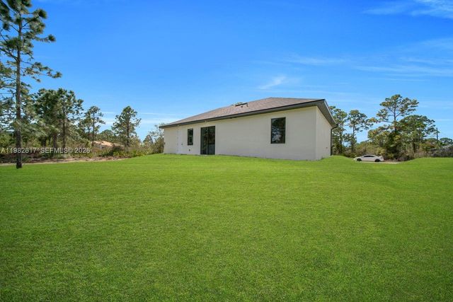 637 Summit Ave S, Lehigh Acres, FL 33974