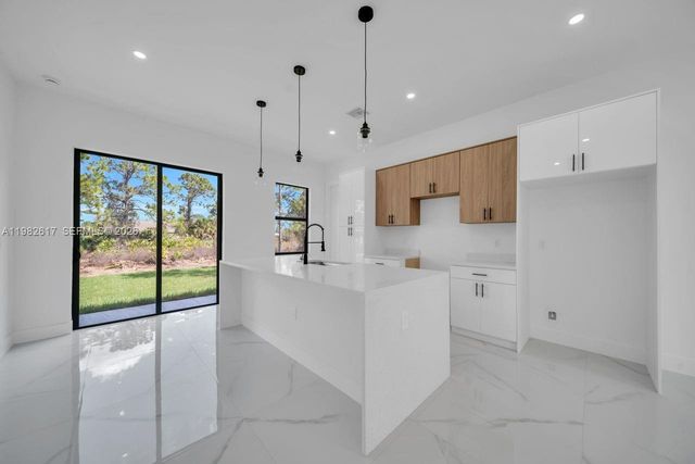 637 Summit Ave S, Lehigh Acres, FL 33974