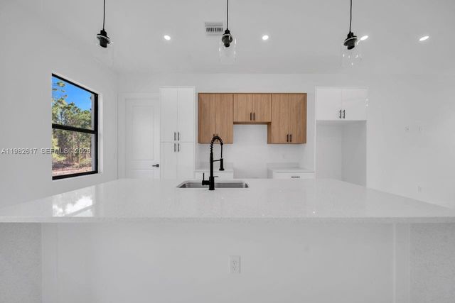 637 Summit Ave S, Lehigh Acres, FL 33974