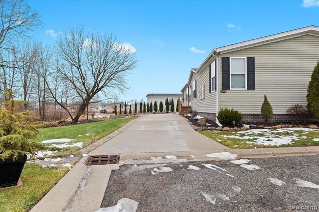 11214 Woodchester Court, South Lyon, MI 48178