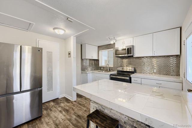 1318 S Dale Court, Denver, CO 80219