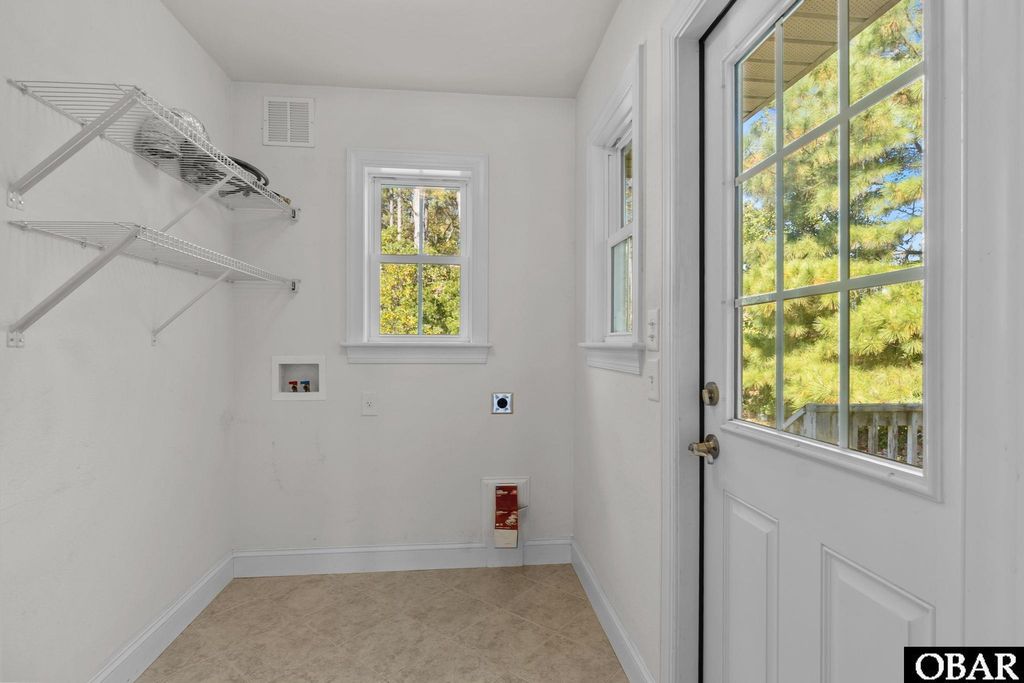 Image 21 of property listing at 601 Viccars Lane Lot 1, Manteo, NC 27954