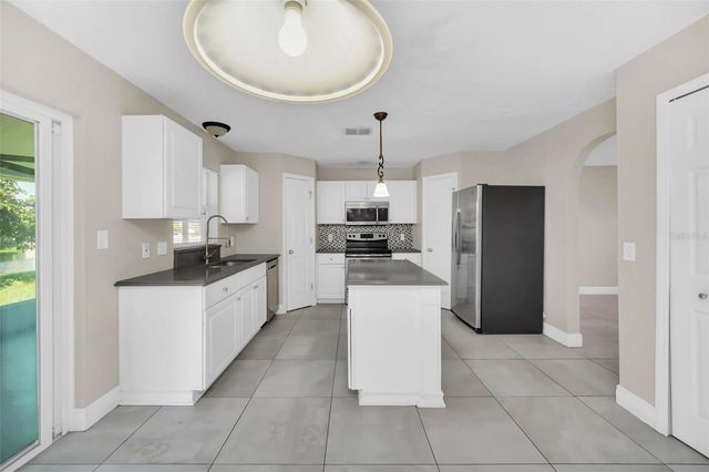 2120 MARISOL LOOP, Kissimmee, FL 34743