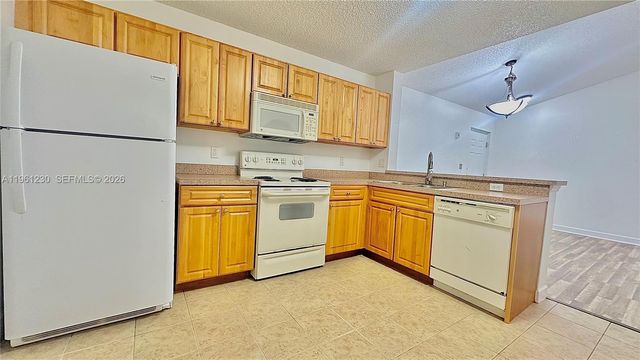 10135 W Sunrise Blvd 304, Plantation, FL 33322