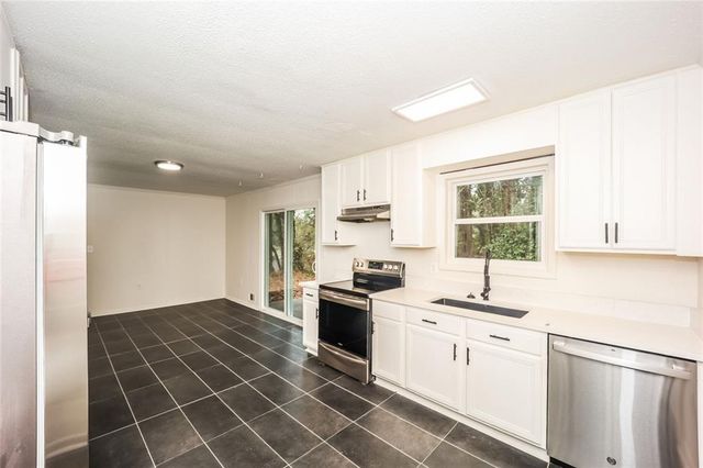 5726 Southwick SW Court, Atlanta, GA 30349