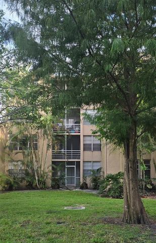 9410 Live Oak Pl 103, Davie, FL 33324