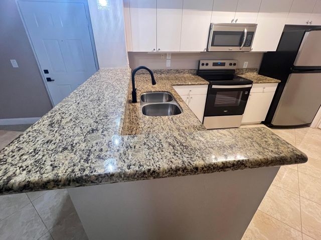11780 St Andrews Place 105, Wellington, FL 33414