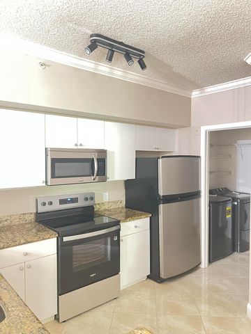 11780 St Andrews Place 105, Wellington, FL 33414