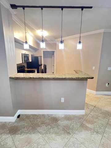11780 St Andrews Place 105, Wellington, FL 33414