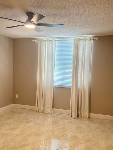 11780 St Andrews Place 105, Wellington, FL 33414
