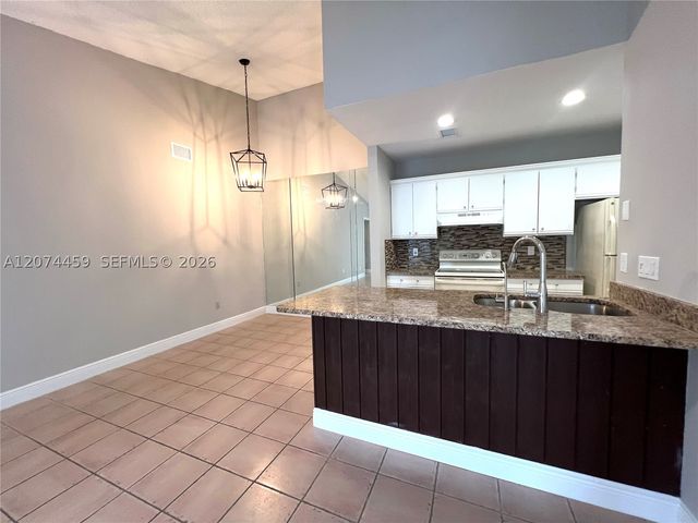 1077 Goldenrod Rd, Wellington, FL 33414