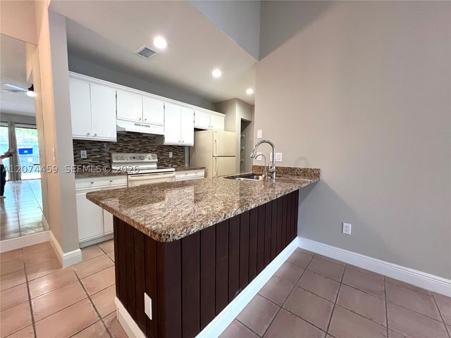1077 Goldenrod Rd, Wellington, FL 33414
