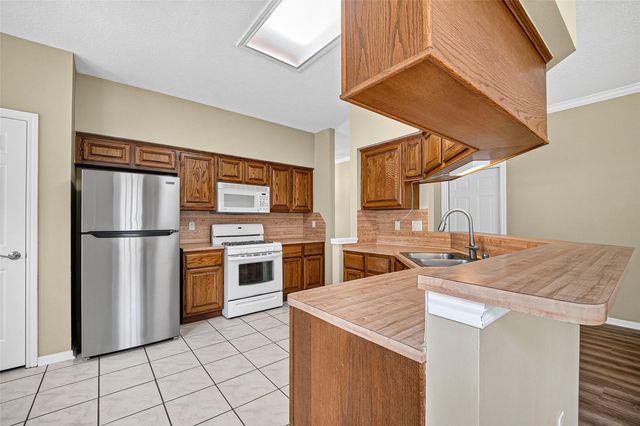 1502 Beechurst Court, Houston, TX 77062